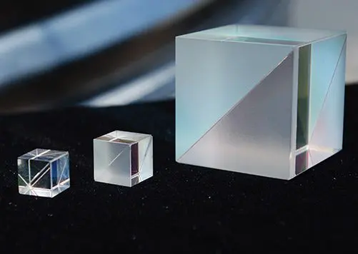 Three glass corner cube prisms.